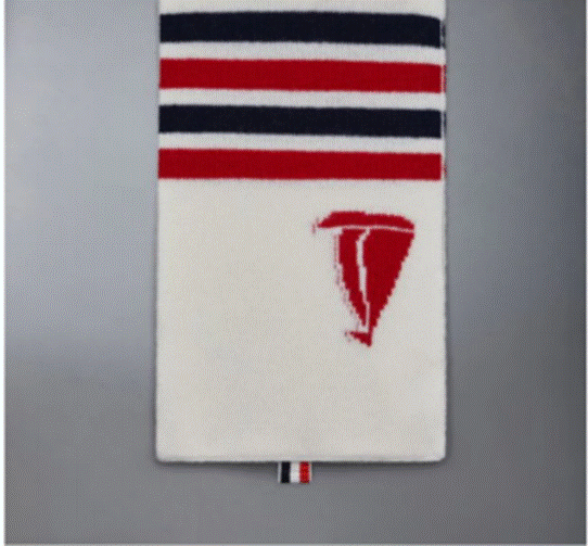A white and red striped towel

Description automatically generated