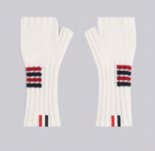 A pair of white gloves with red and blue stripes

Description automatically generated