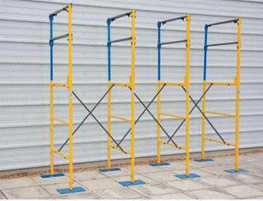 A group of yellow and blue scaffolding

Description automatically generated