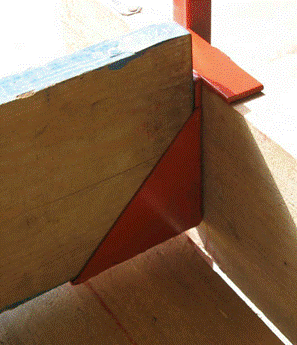 A close-up of a metal corner

Description automatically generated