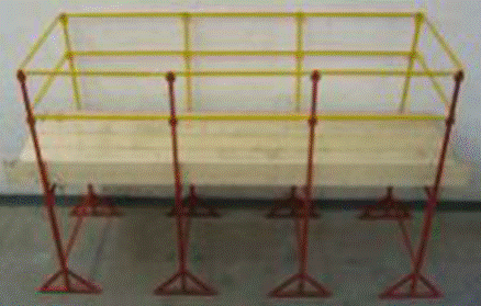 A row of red poles

Description automatically generated