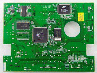 A green circuit board with many chips

Description automatically generated